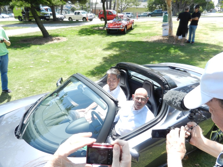 Congressman Waxman in a Tesla, contemplating how fast he could drive away from DC in one of these EVs. (c) Joe Galliani